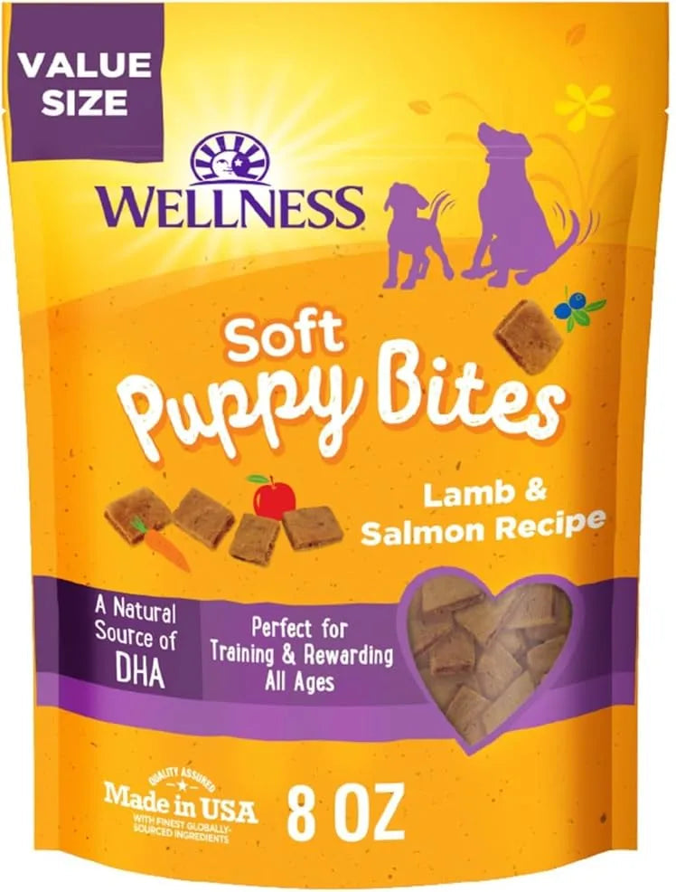 Two packages of Wellness Soft Puppy Bites Lamb & Salmon Recipe on a white background
